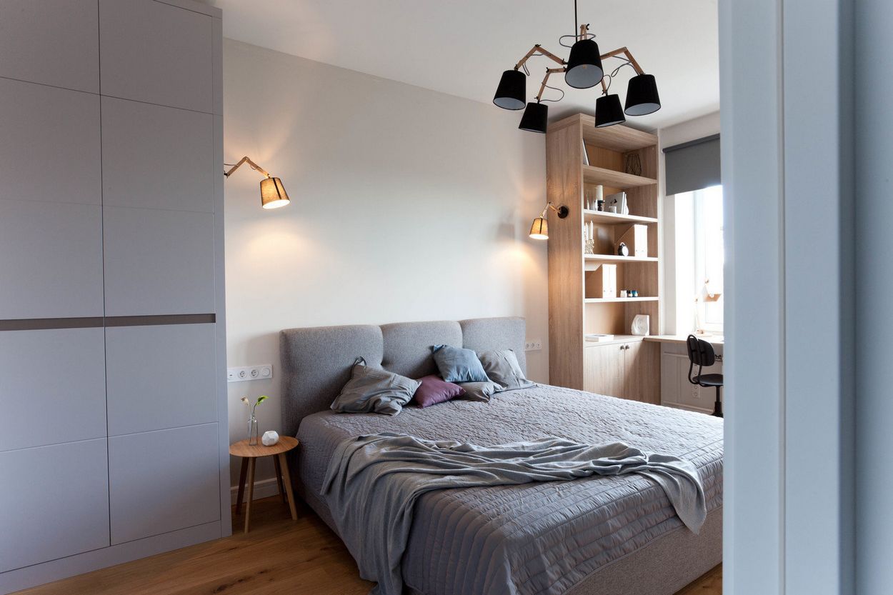 56m2-es lakás kényelmes konyhával és hálószobával, üvegezett válaszfalakkal, tolóajtókkal könnyítve a teret a nappali zónában 56m2-es lakás kényelmes konyhával és hálószobával, üvegezett válaszfalakkal, tolóajtókkal könnyítve a teret a nappali zónában