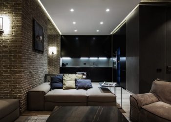 60m2-es modern lakás sötét, meleg tónusokkal, elegáns berendezéssel, nagy, nyitott nappali térrel