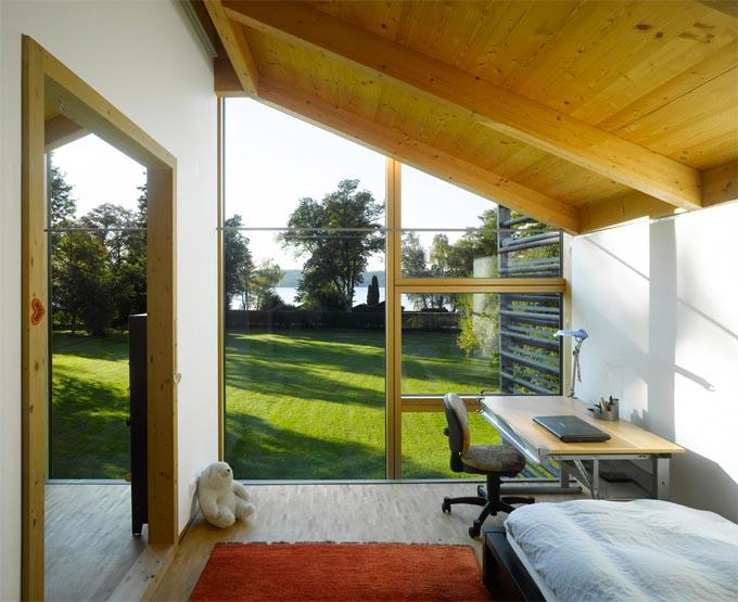 Modern, minimalista otthon és munkahely - a csónakház ihlette Nobis Housen