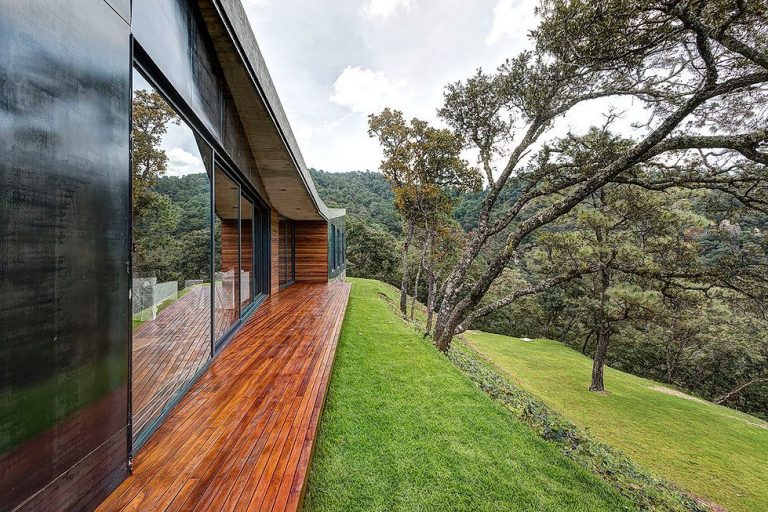 Fa, üveg, polírozott acél, beton és csodás panoráma - Casa GG / Elías