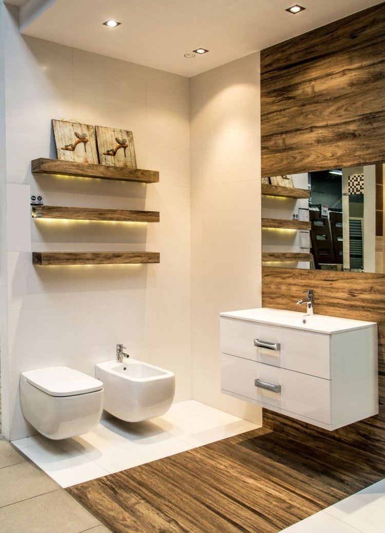 Érdekes látványelemet alakíthatunk ki egy padló és fal sáv sötétebb fahatású kerámia burkolatával Érdekes látványelemet alakíthatunk ki egy padló és fal sáv sötétebb fahatású kerámia burkolatával