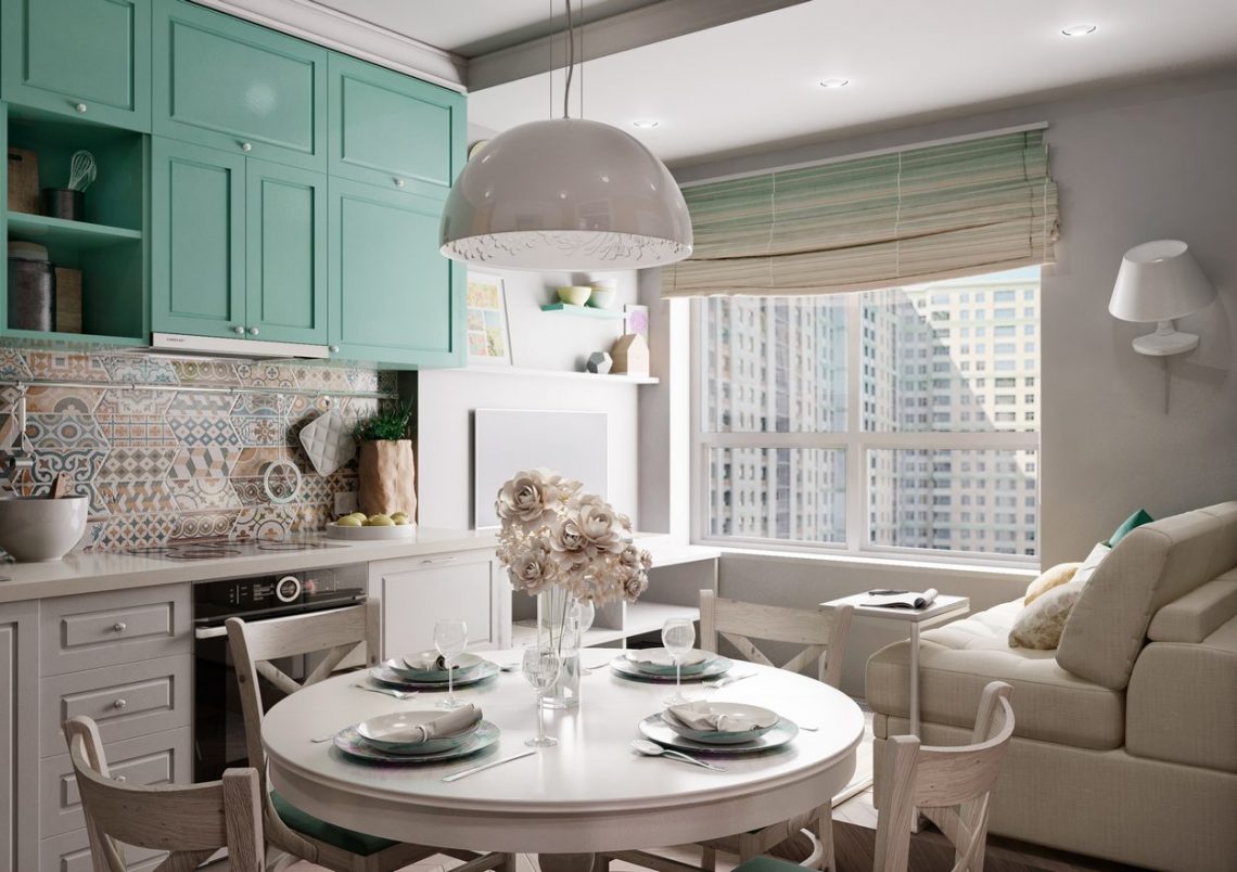Konyha pasztell színekkel díszítve, kerek étkezőasztal, kanapé - zöld, bézs, fehér