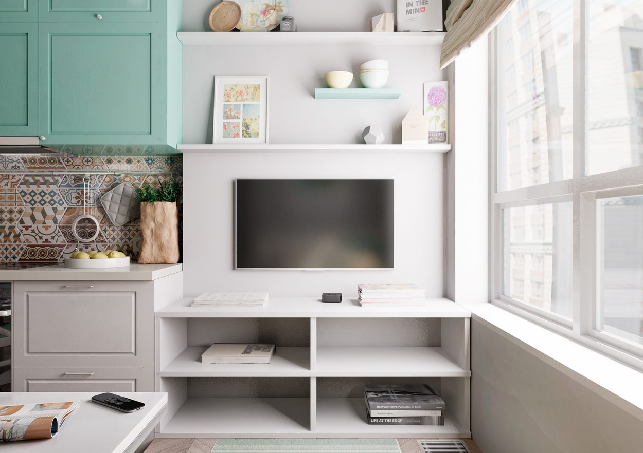 konyha pasztell szinekkel diszitve kerek etkezoasztal kanape zold bezs feher 03