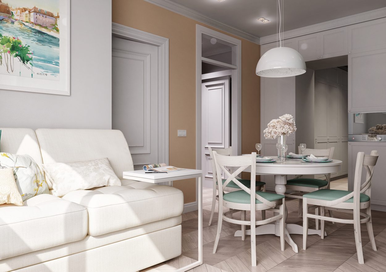 konyha pasztell szinekkel diszitve kerek etkezoasztal kanape zold bezs feher 05