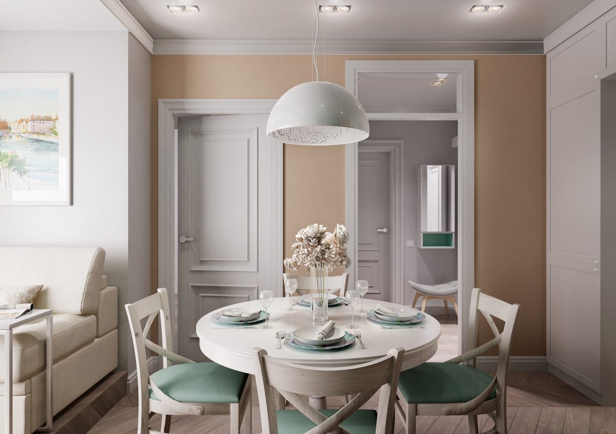 konyha pasztell szinekkel diszitve kerek etkezoasztal kanape zold bezs feher 06