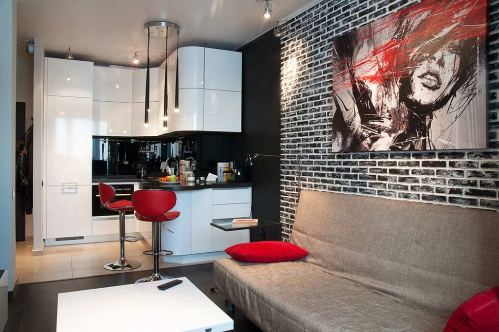 Kétszobás kis lakás kontrasztos dekorációval, fényes fehér konyhával és bútorokkal
