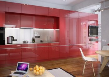 Modern kis lakás piros magasfényű konyhabútorral a középpontban